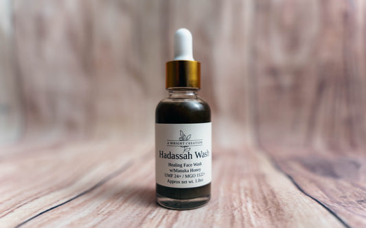 Bottle of Hadassah Wash on a wooden surface
