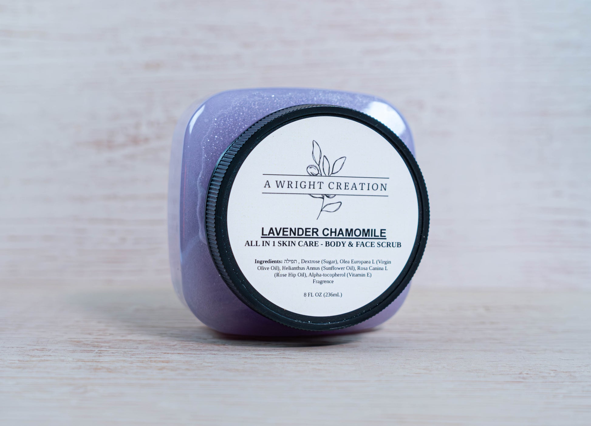 A jar of A Wright Creation's Lavender Chamomile Body and Face Scrub.