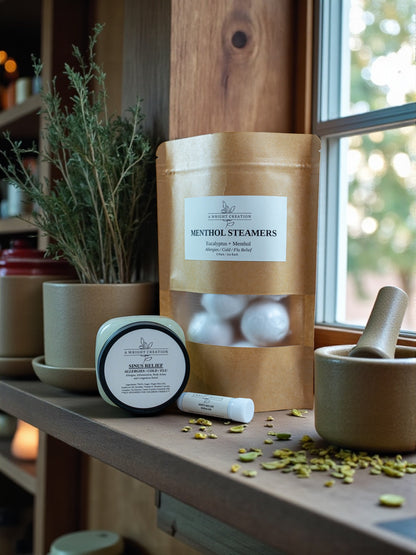 Menthol steamers and a jar on a wooden surface with plants in the background